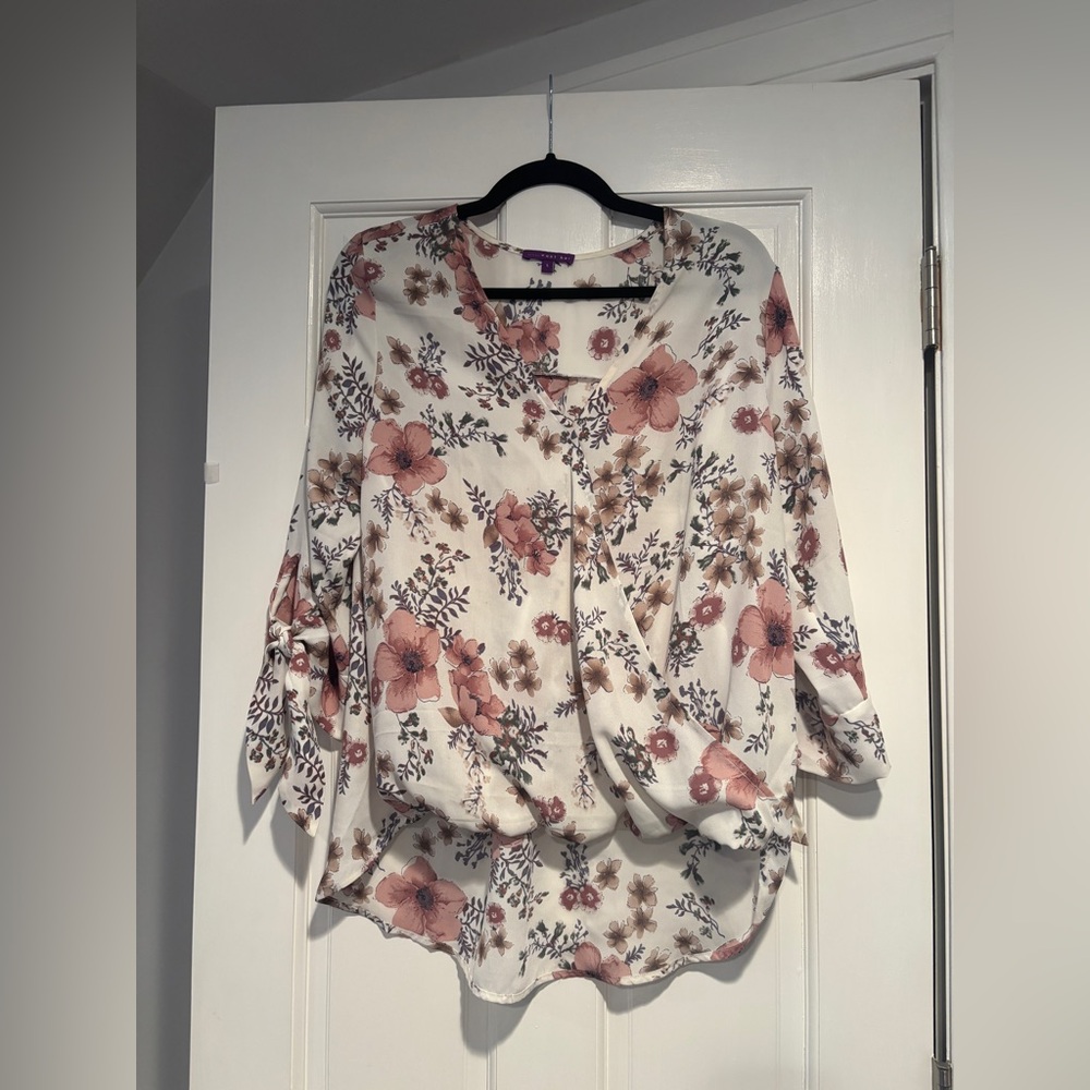 White with taupe and mauve colored flowered three quarter length tie sleeve top
